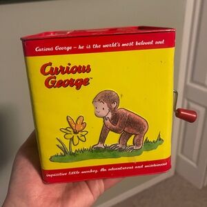 Curious George tin “Jack-in-the-Box”